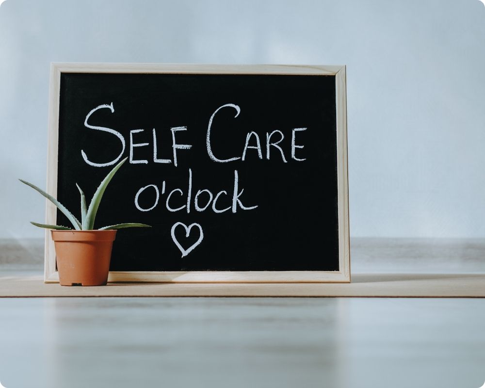 Chalk Board with Self-Care written in chalk. Highlighting the need for Self-Care Activities for Nurses.