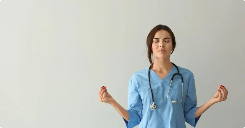 A nurse taking a moment to breath. Symbolizing a step toward recovery.